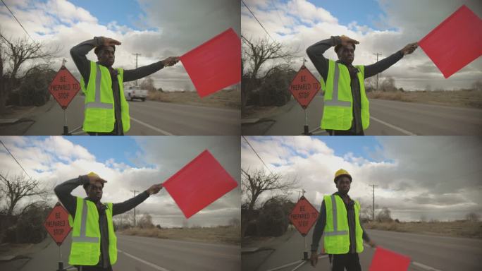 道路工作区旗人黑人非洲男性道路施工和交通流量工人4K视频系列