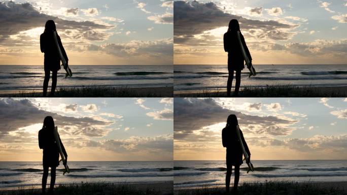 视频肖像非洲澳大利亚女冲浪者在日出时望着冲浪