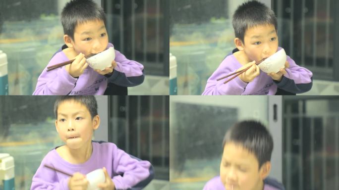 小孩子 吃大米饭