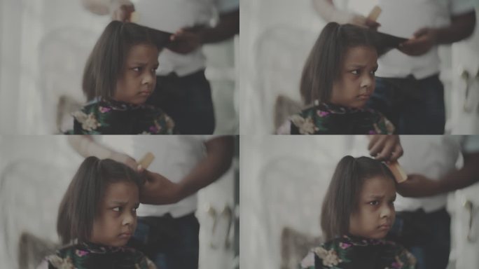 情绪低落黑人小女孩剪头发焦虑理发师托尼