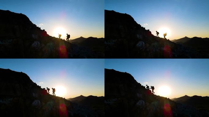 团队登山勇攀高峰爬山剪影成功登顶登山运动
