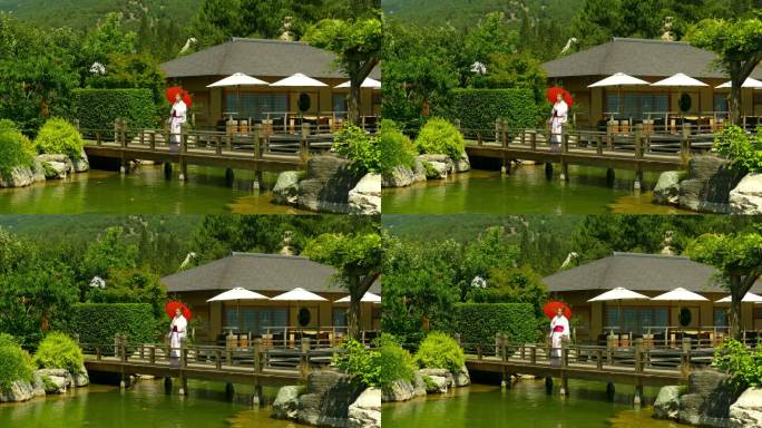 一个穿着和服的女人在池塘上的桥上，背景是茶馆