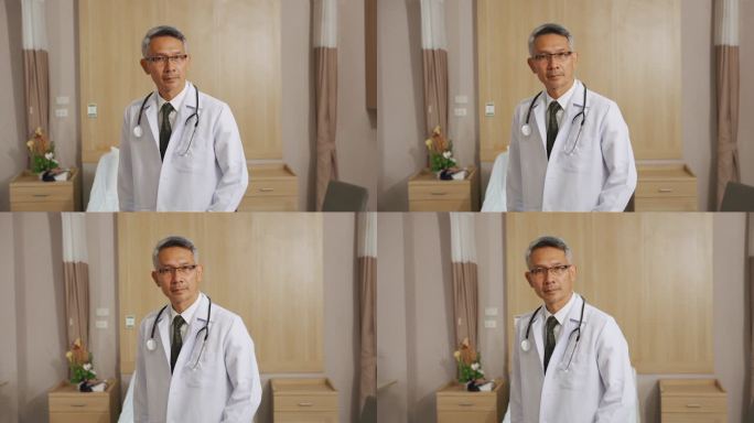 亚洲医生的肖像男医生资深教授看向镜头
