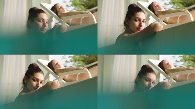 女人在泳池里放松惬意沐浴比基尼享受温泉浴