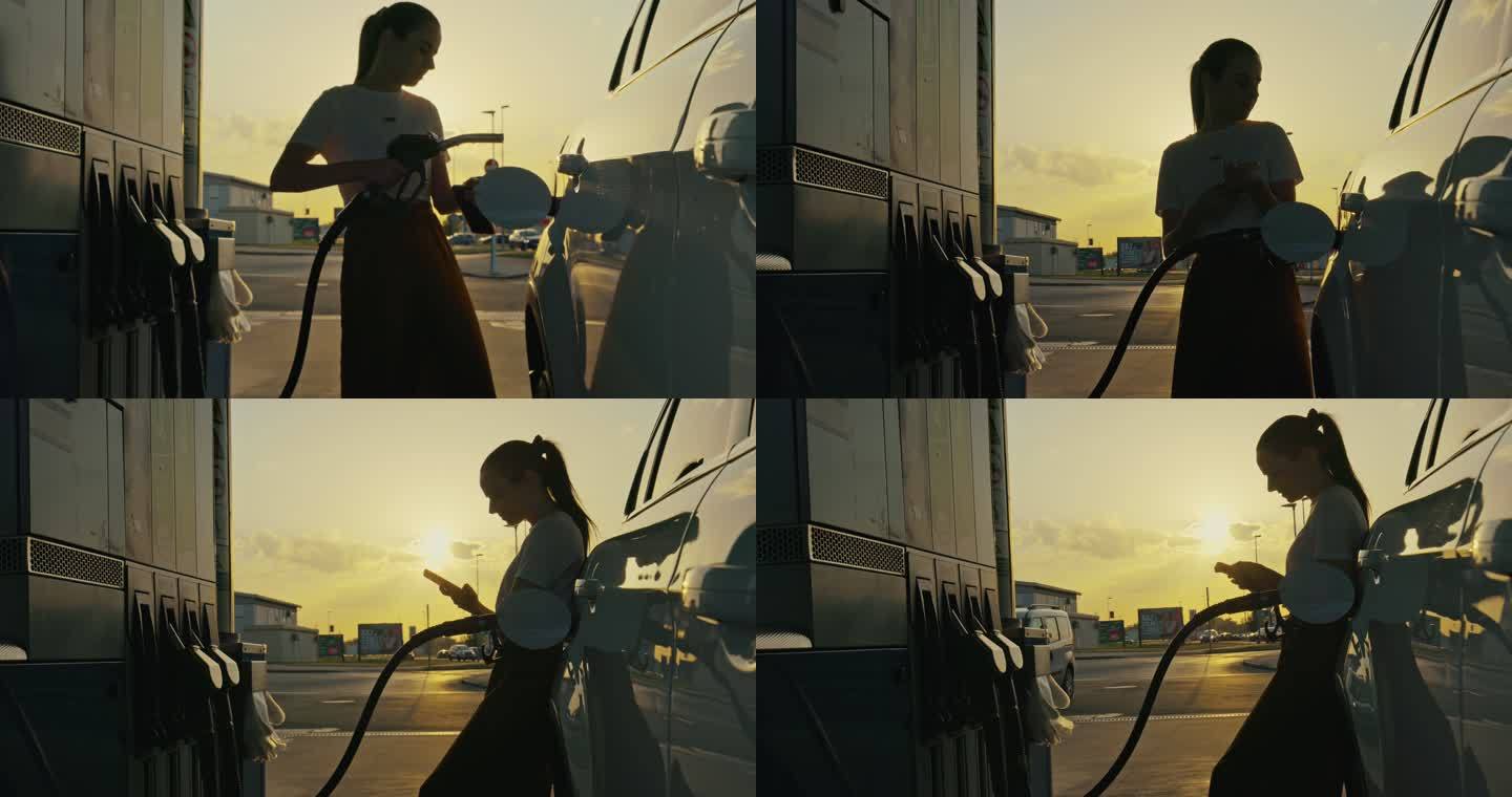 WS：一名年轻女子在给汽车油箱加油时使用手机
