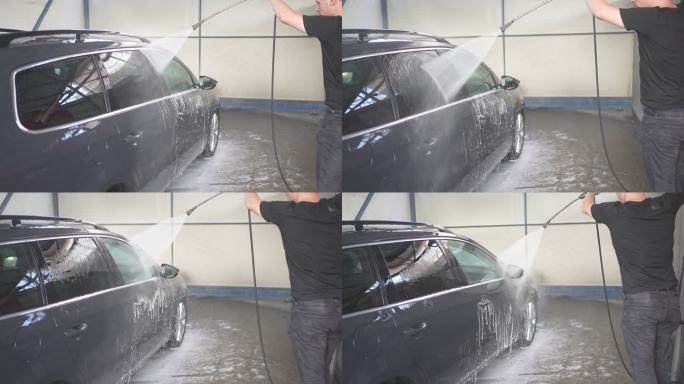 汽车侧面喷水以去除洗车时的泡沫和污垢