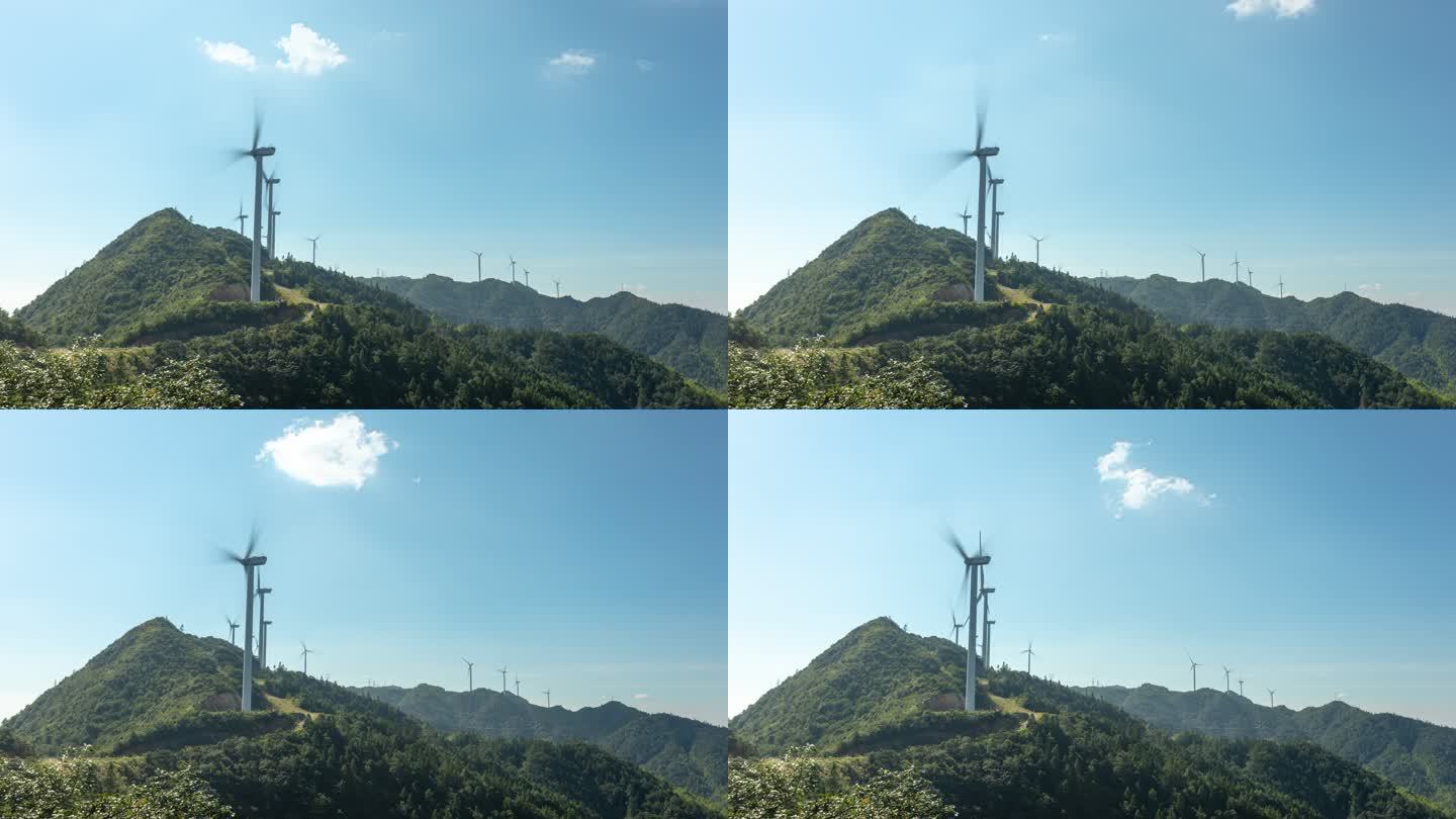 发电风车吊装扇叶大山里的发电站
