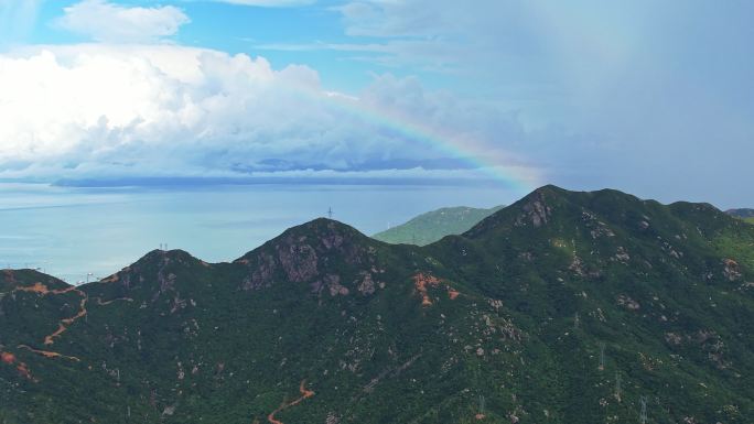 航拍双彩虹海岸线海边礁石国家地理风景