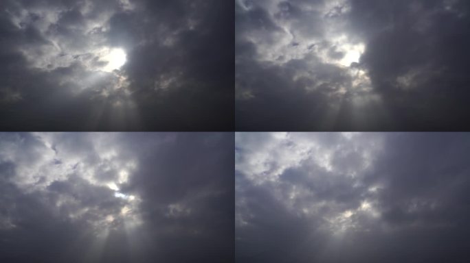 阳光穿过乌云穿透云朵云层光束丁达尔光延时