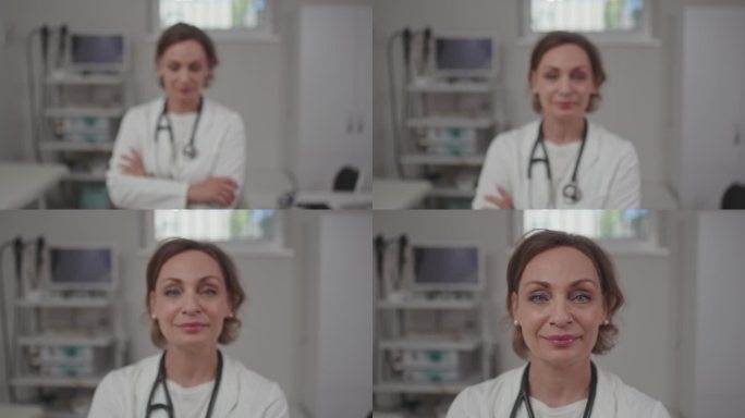 女医生对着镜头微笑的选择性对焦镜头