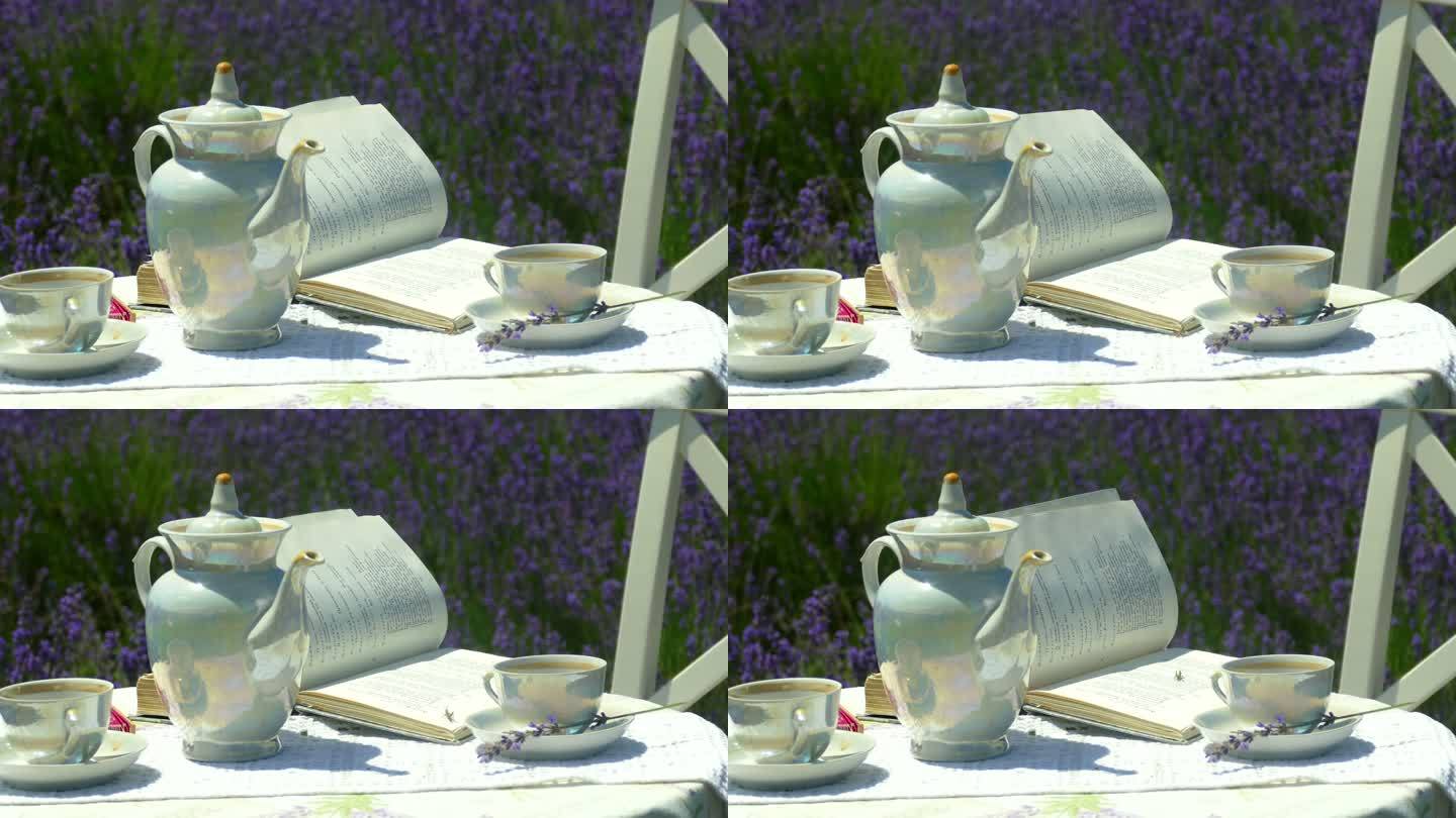背景-在薰衣草地上放着一本书的茶几