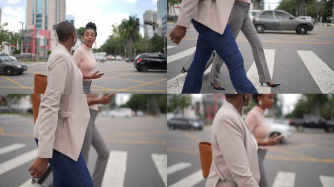 商务女性在户外散步时使用智能手机