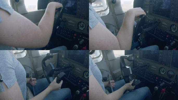 年轻成年女飞行员检查小型单引擎飞机飞行控制装置的运动范围