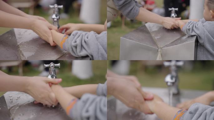 公园家长给孩子洗手
