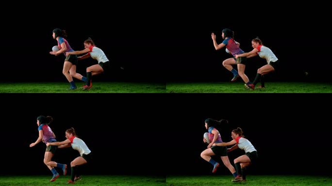 SLO MO LD女橄榄球运动员试图从她的对手手中逃跑，她抓住了自己的腰部