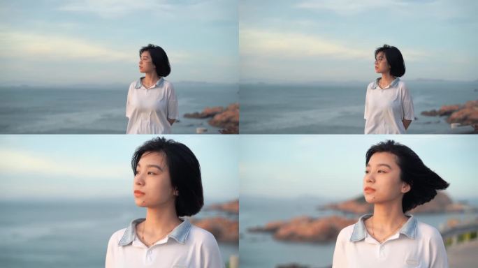 短发美女孩一个人走在海边看海散心孤单情绪