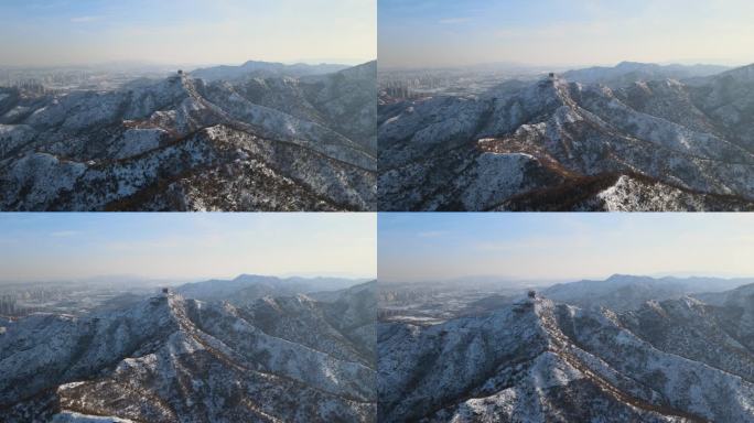 航拍雪后阳光下的威海里口山仙姑顶