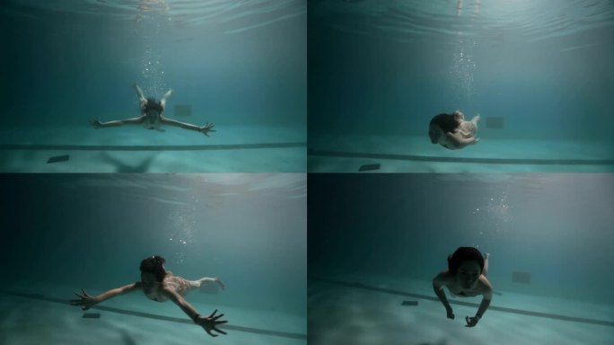 淹没的年轻女子潜水自由泳换气