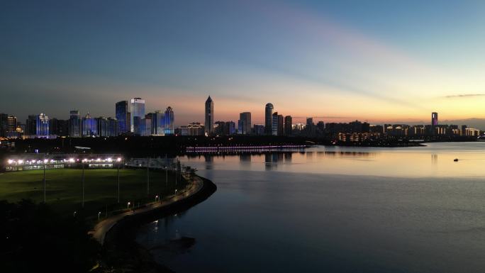 4K航拍晚霞海南海口湾大海城市夕阳剪影