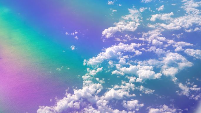 从飞机窗口拍摄的4K美丽彩虹光谱彩色云天和海景
