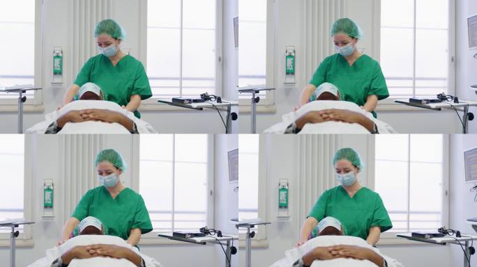 眼科医生与女患者在手术室