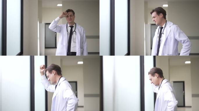 紧张的医生站在窗前。