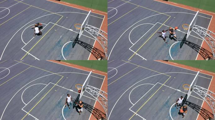 两个面目全非的男子在打篮球时将球射入篮筐。年轻人从上面玩体育