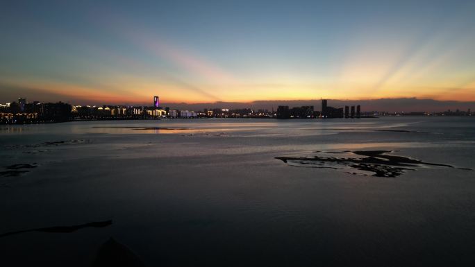4K航拍晚霞海南海口湾大海城市夕阳剪影