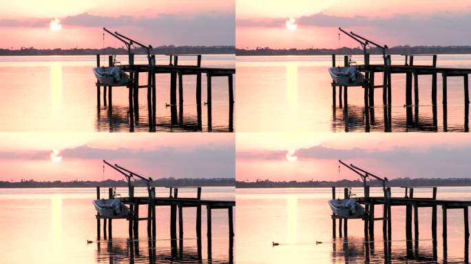 码头上的日出平静湖面日落夕阳朝阳晨光