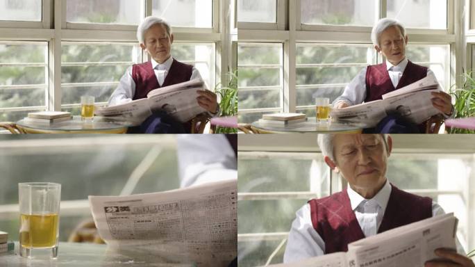 惬意的午后看报的老人中老年男士窗前看报纸
