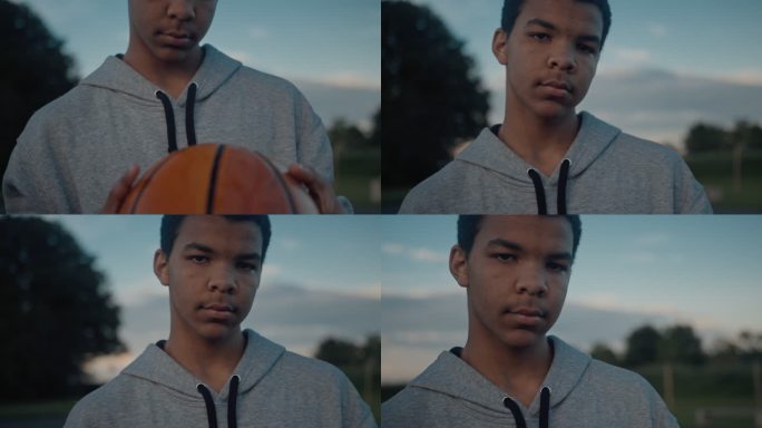 SLO MO一名青少年篮球运动员拿着球的肖像
