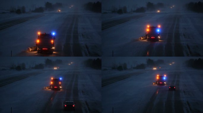 冬夜州际公路，雪和犁纷飞