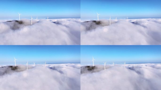 航拍高山顶上的风力发电风车和山间的云海