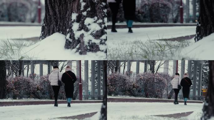 欧洲冬天下雪的傍晚街道上行走的女孩