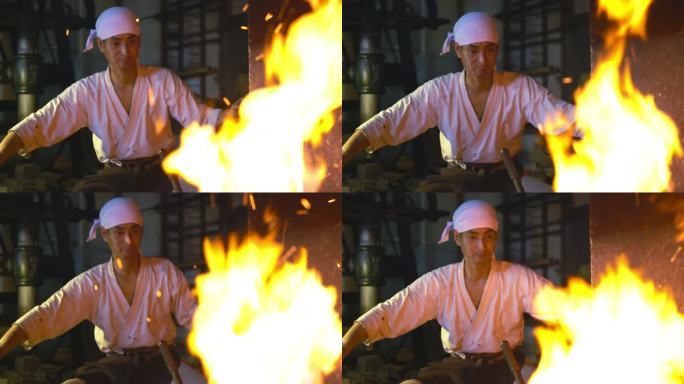 铁匠穿过火炉的火焰