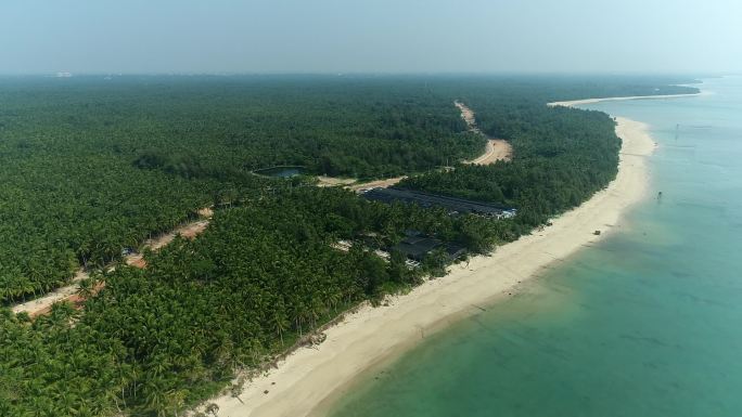 航拍海南文昌东郊椰林大海蓝天滨海大道