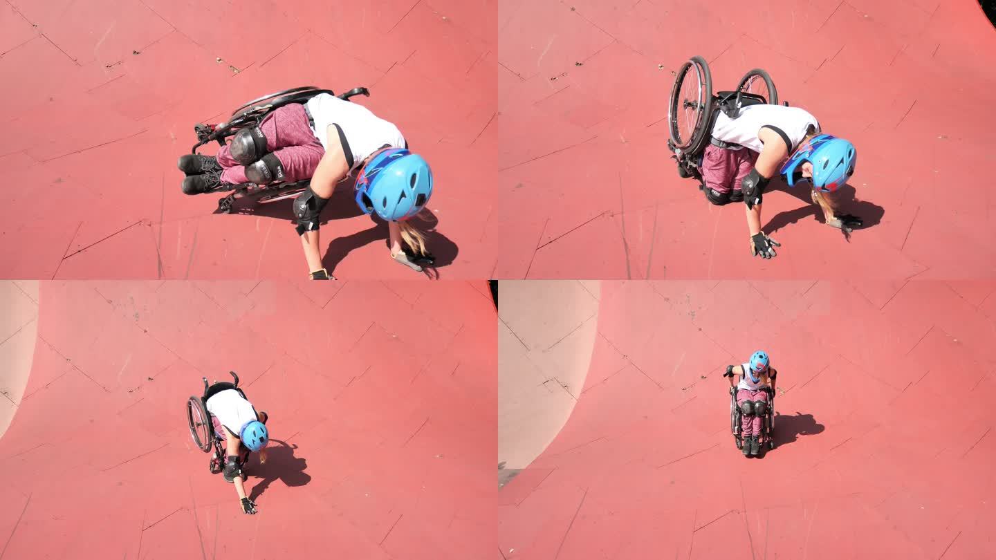 残疾的Z世代女性坐在轮椅上在溜冰场表演特技并摔倒