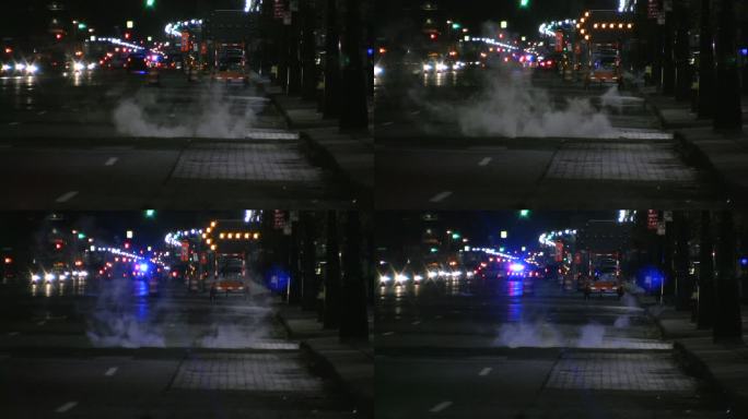 城市闪烁。夜间城市交通。前方有救护车和警车。