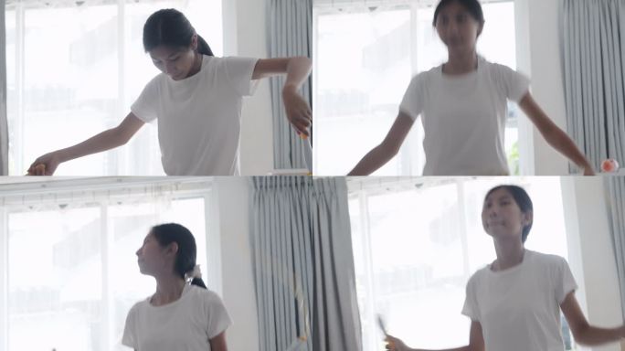 亚洲女孩在家里靠窗跳长袍，居家锻炼生活方式理念。