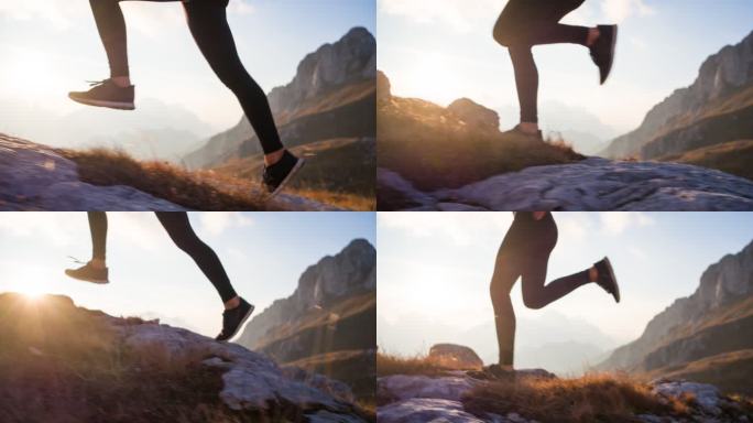 在山上跑步，在夕阳的照射下，可以看到运动员的腿