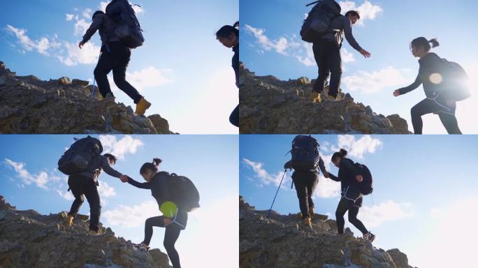 登山团队手拉手爬山攀登高峰夫妻旅行探险者