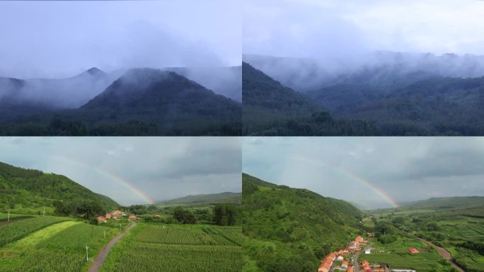 山村一边打雷下雨一边腾起云雾和雨后的彩虹