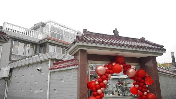 农村结婚气球拱门布置红色气球