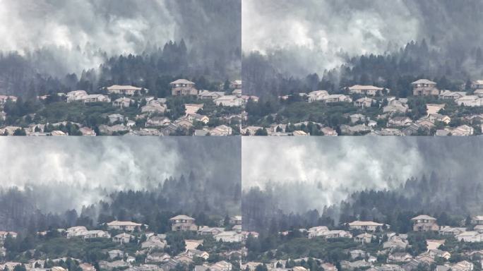 科罗拉多州斯普林斯市房屋上方的高清视频森林燃烧