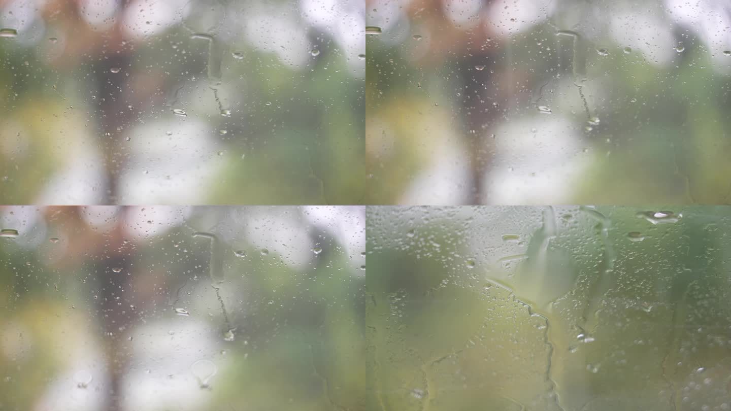 雨天雨水落在汽车玻璃上