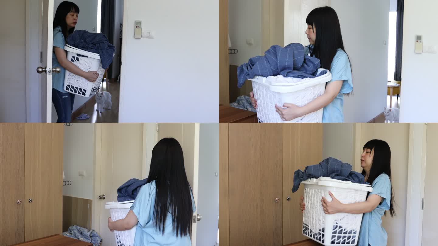 做家务的女人家庭主妇打扫房间整理衣物