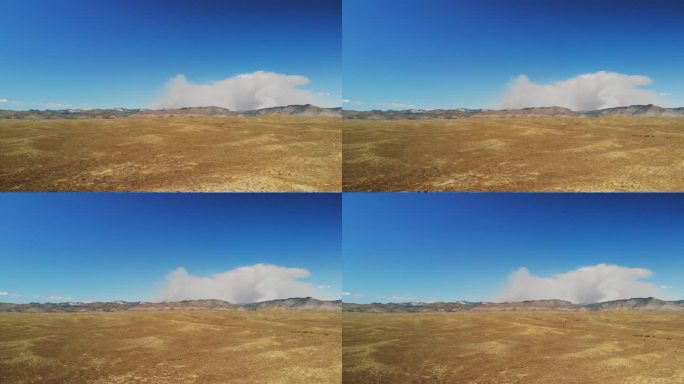 充满活力的雄伟山脉和云景科罗拉多州Bookcliff山脉鸟瞰森林火灾烟雾4K视频
