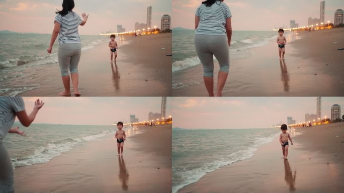 慢动作：亚洲男婴在海滩上玩耍