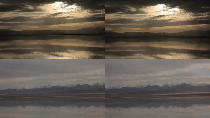 青海湖晚霞阳光透过云层直射水面