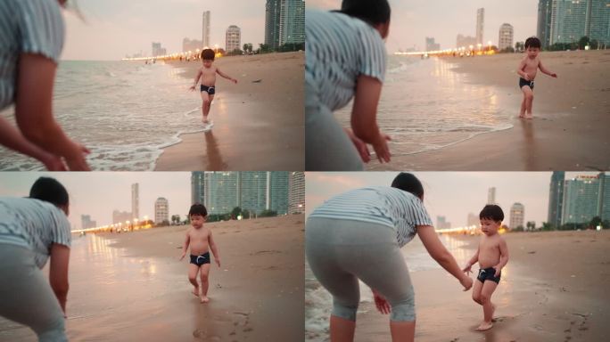 妈妈和小儿子在芭堤雅海滩上一起玩耍。
